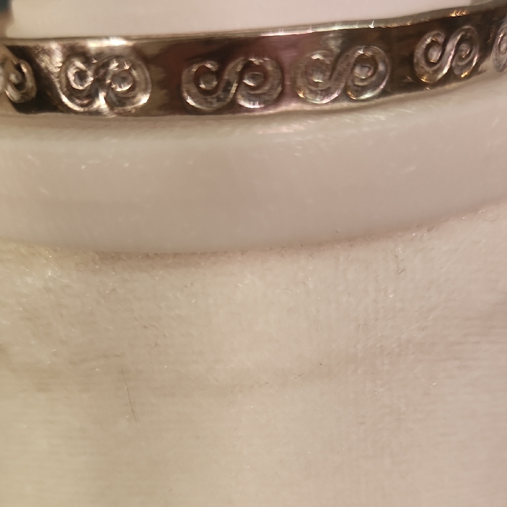 Elegant Silver Swirl Bracelet